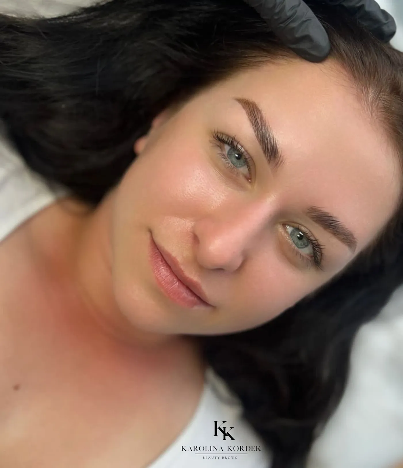 Client with freshly finished soft ombre brows